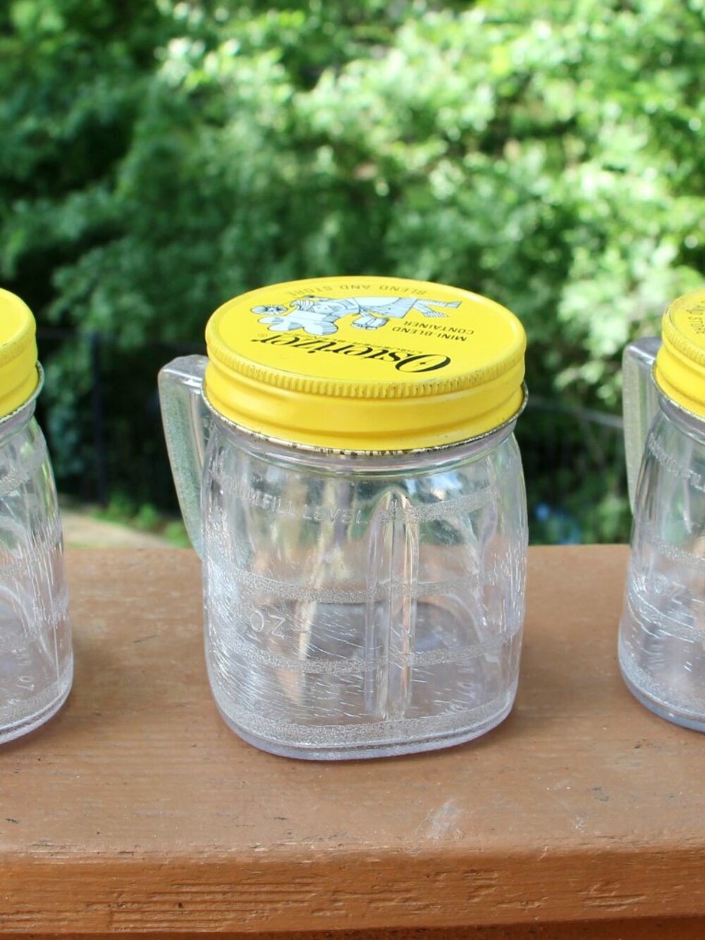 Vintage Osterizer jars with lids
